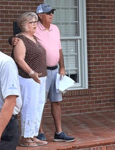 Cathy Taylor and Ricky Huner speaking before the tournament