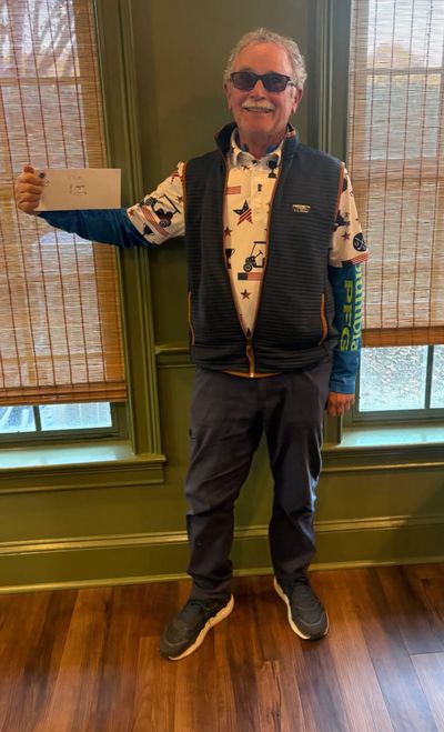 Dan O'Neill represented his team with the winning 50/50 Raffle Ticket.