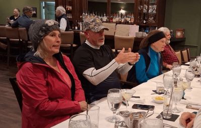 Melanie Little and others enjoying each other's company before dinner.